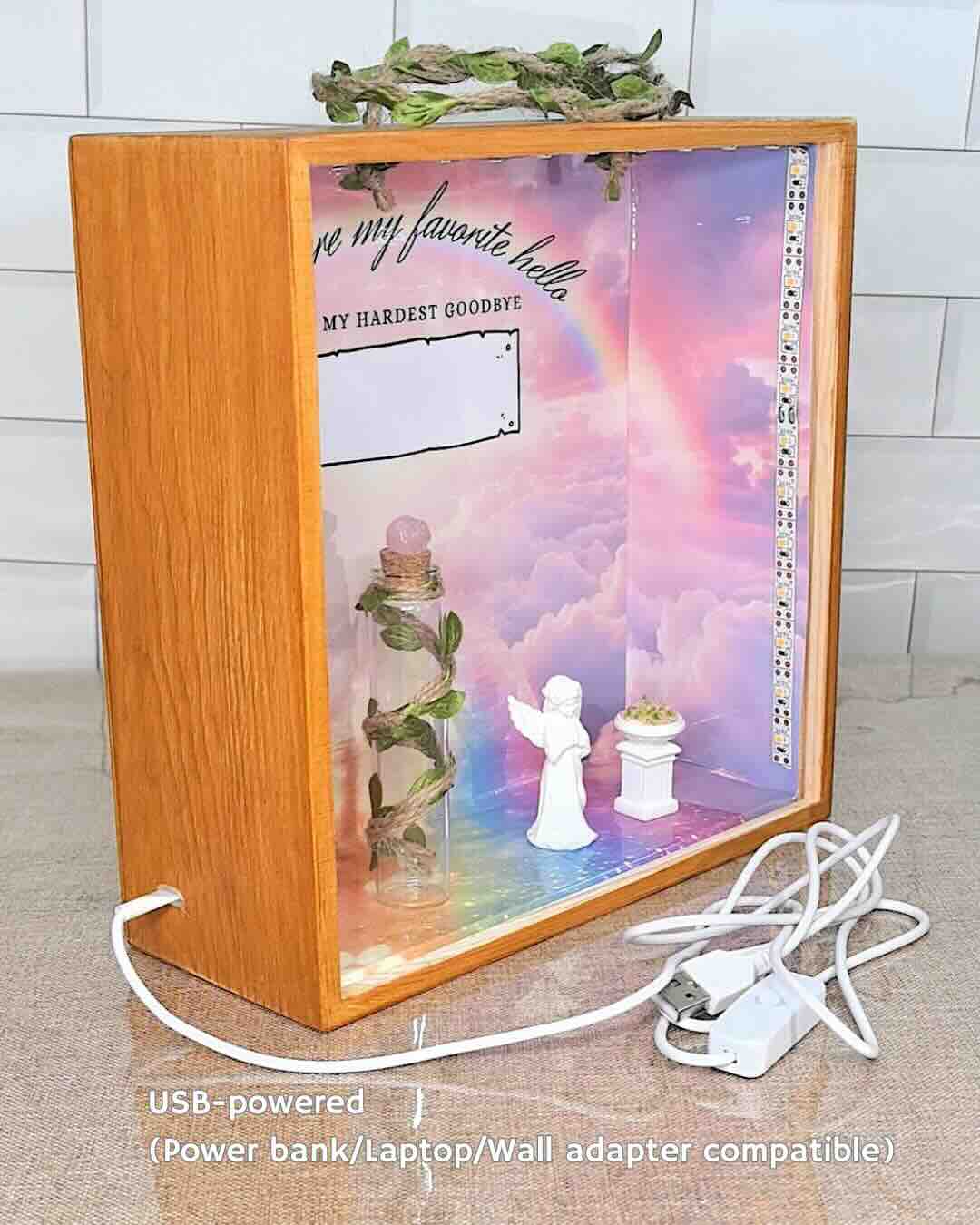 Rear view and side profile of a USB-powered pet memorial shadow box with a wooden frame, featuring elegant ivy decoration and convenient LED light connectivity.