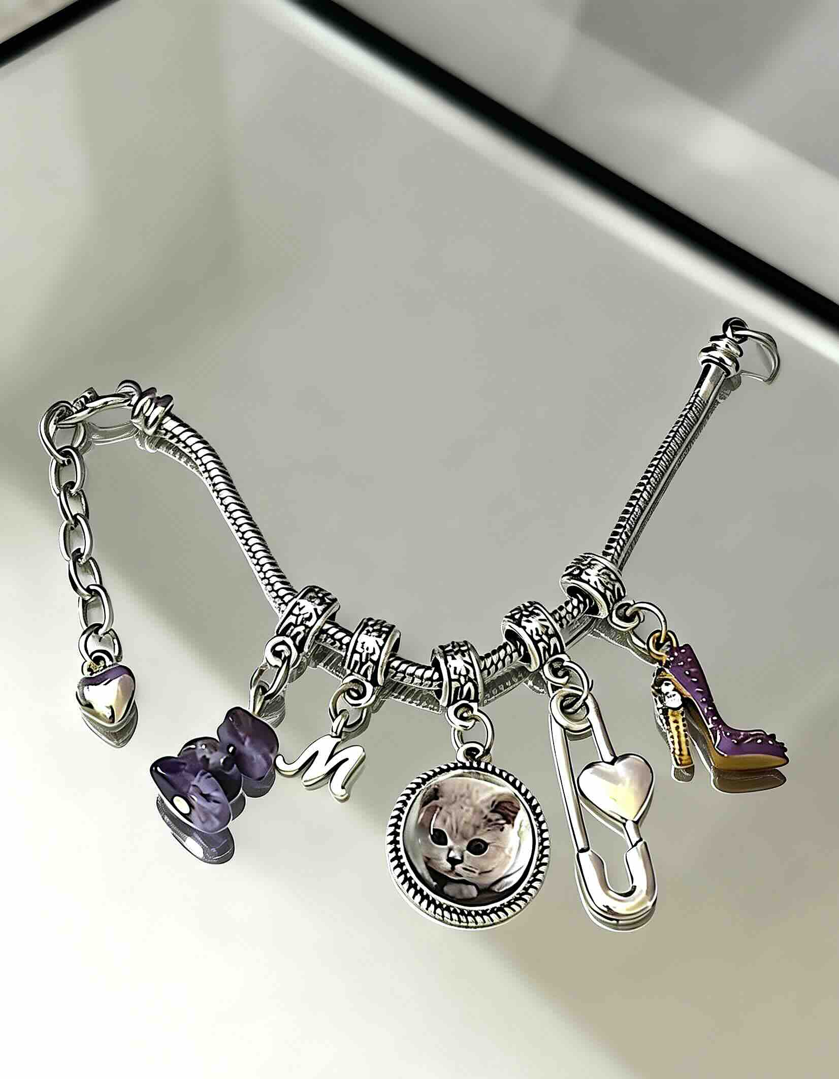 A touching pet loss sympathy gift featuring a custom crystal portrait charm, a meaningful keepsake to keep your rainbow bridge pet close forever.
