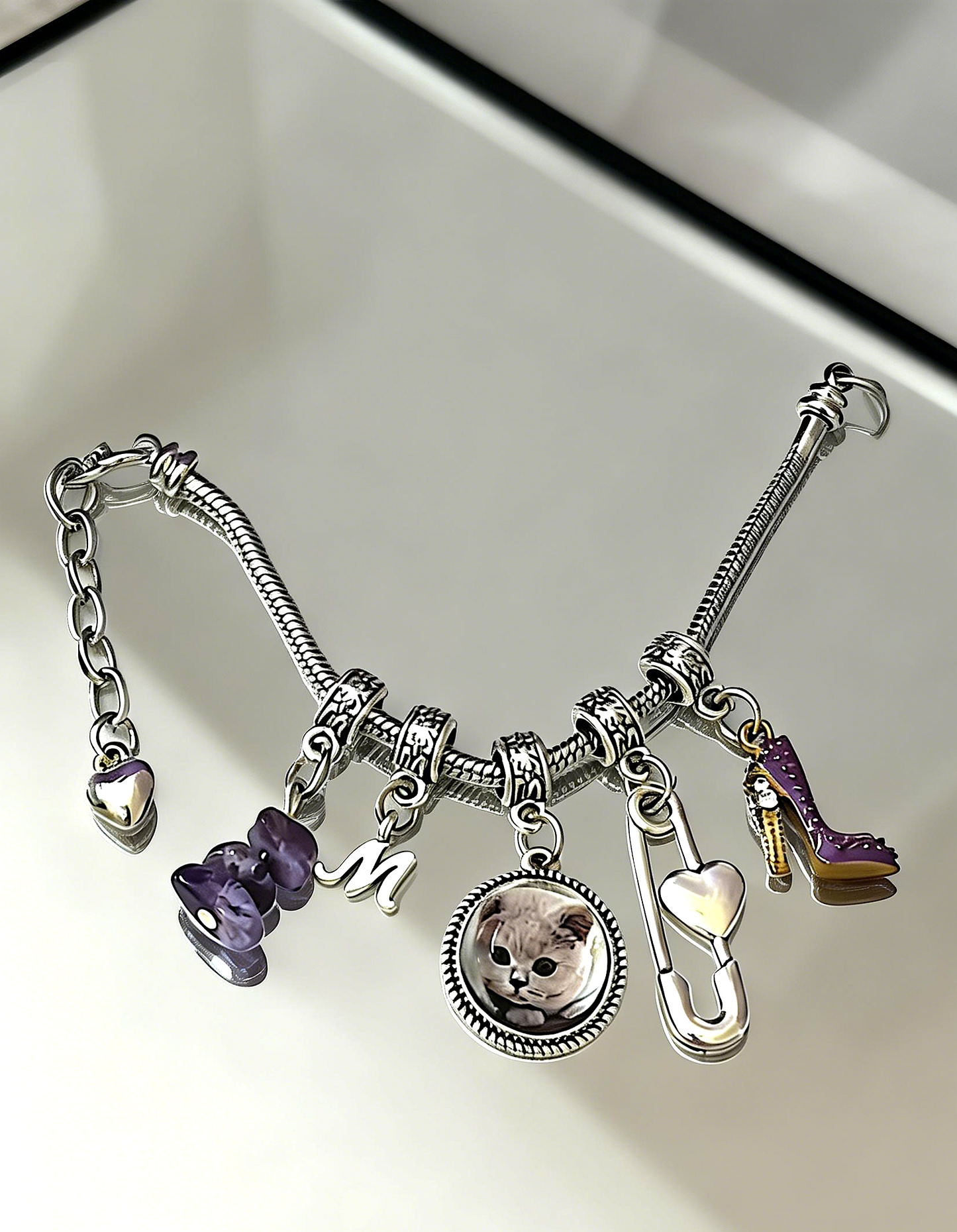 A touching pet loss sympathy gift featuring a custom crystal portrait charm, a meaningful keepsake to keep your rainbow bridge pet close forever.