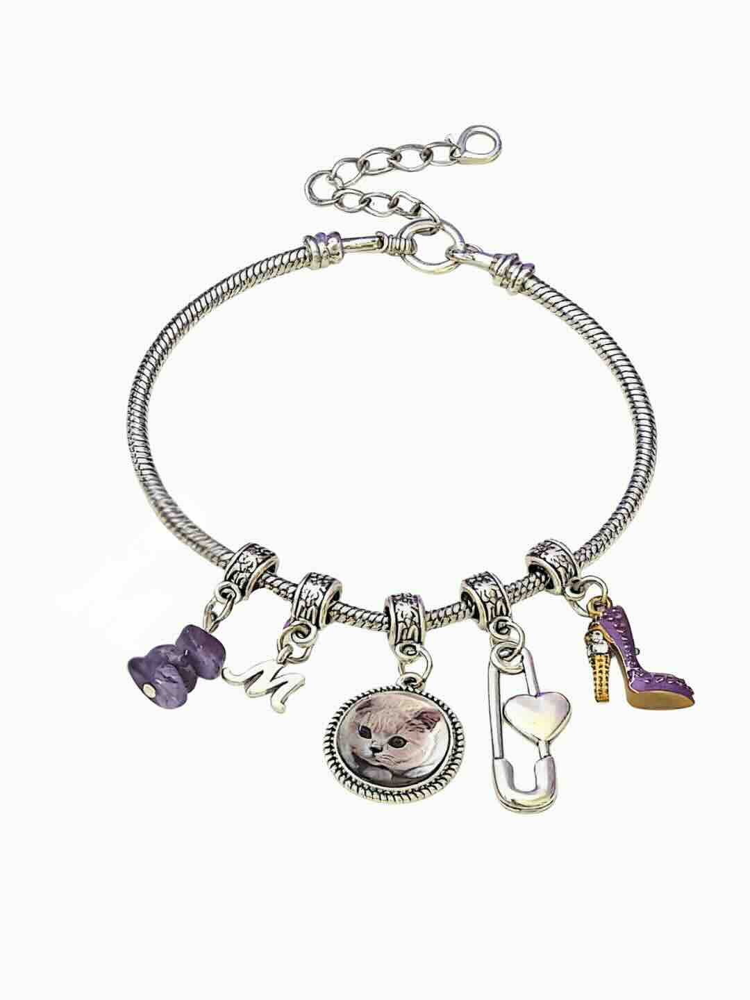 Handcrafted natural Amethyst crystal bag charm for pet memorial, featuring a custom pet portrait and healing purple gemstones to soothe grief.