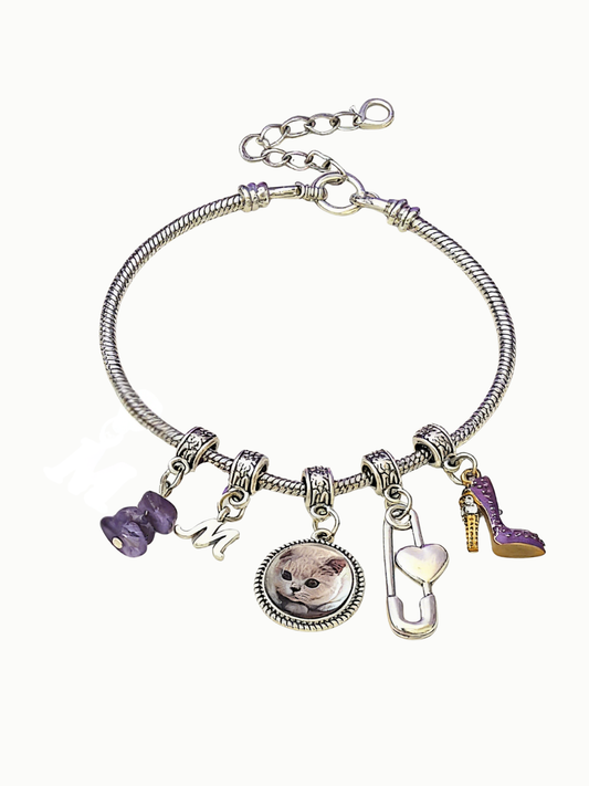 Handcrafted natural Amethyst crystal bag charm for pet memorial, featuring a custom pet portrait and healing purple gemstones to soothe grief.