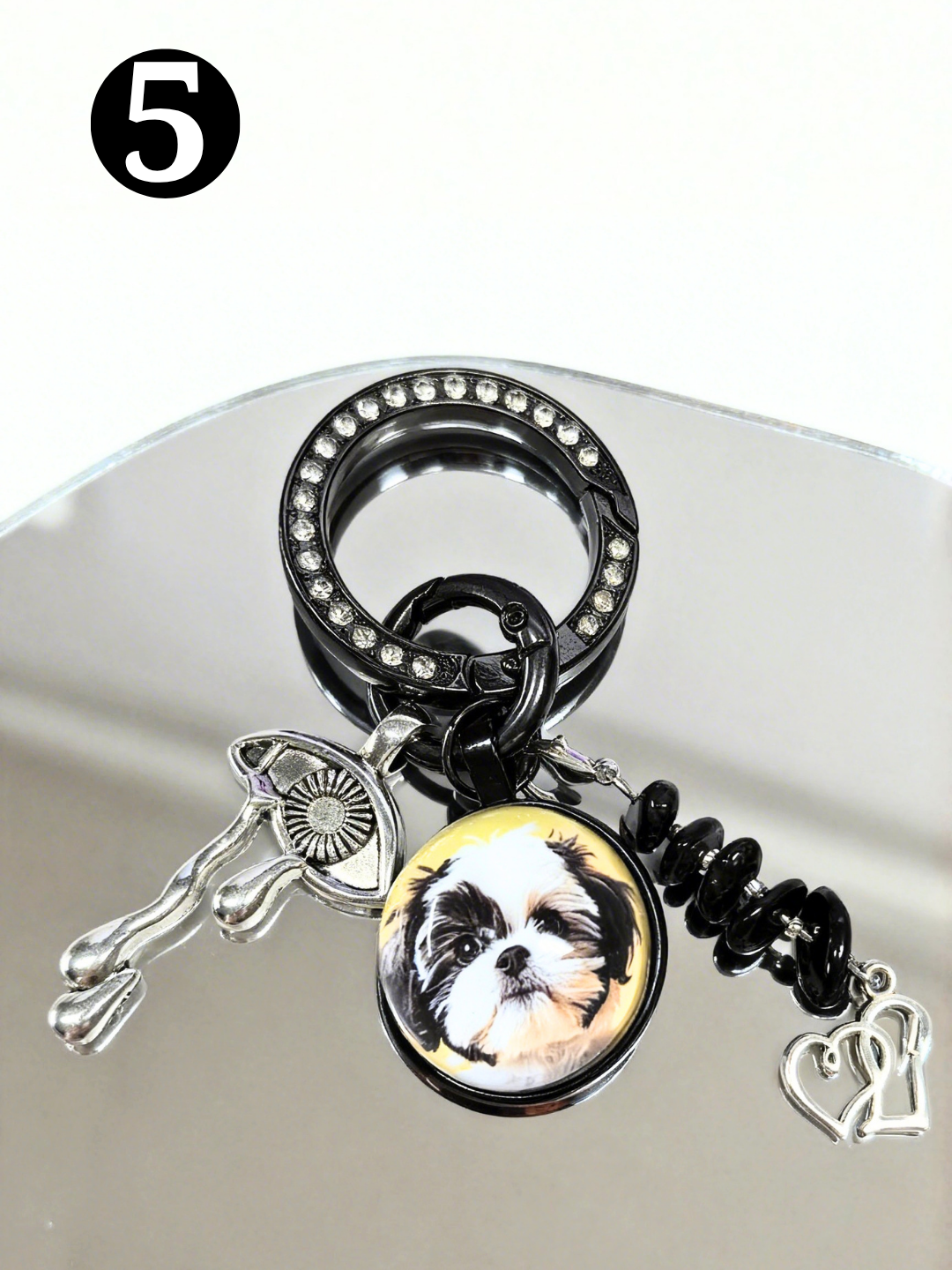 Thoughtful pet bereavement crystal keepsake bag accessory, the perfect sympathy present for a friend mourning a pet.
