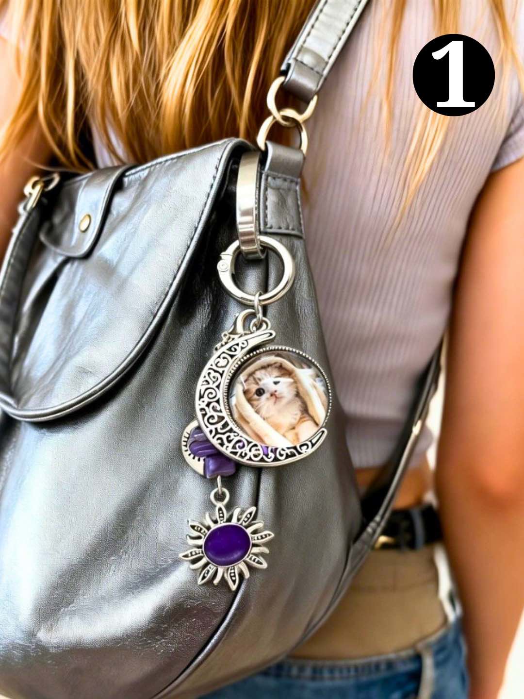 Personalized pet photo bag charm with a circular portrait pendant.